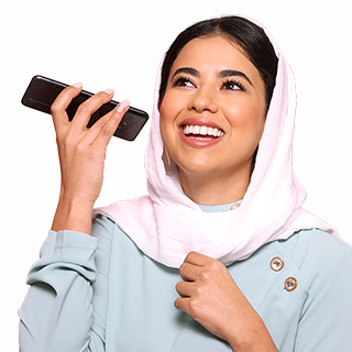 The image Featuring a woman smiling and holding a phone.